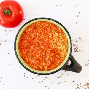 Spicy tomato and couscous soup M'deshesha