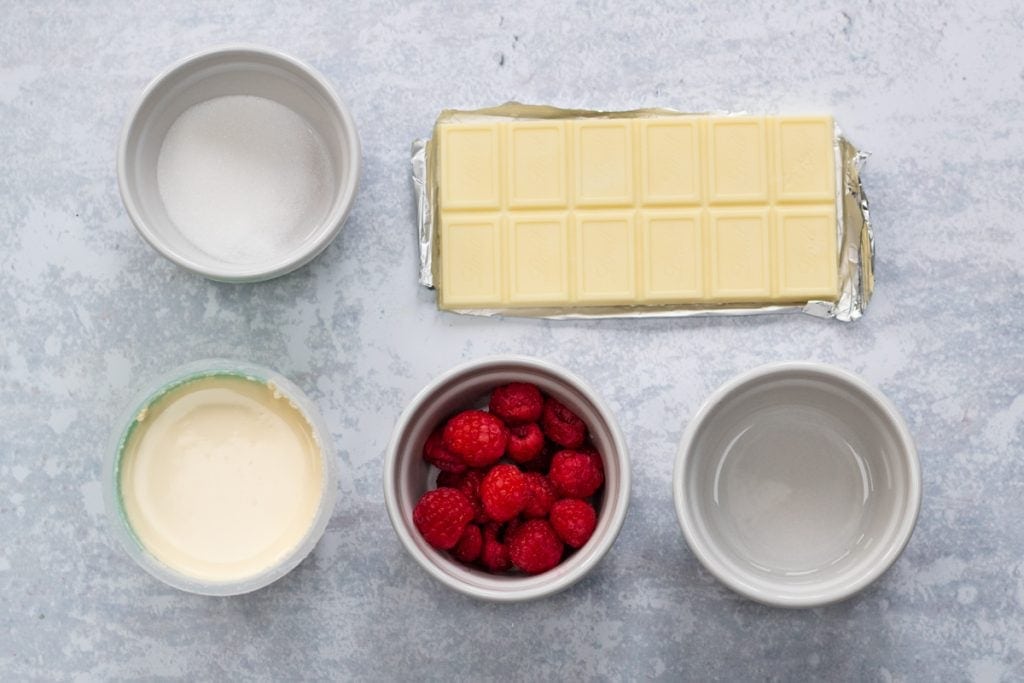 Ingredients for white chocolate mousse and raspberry sauce