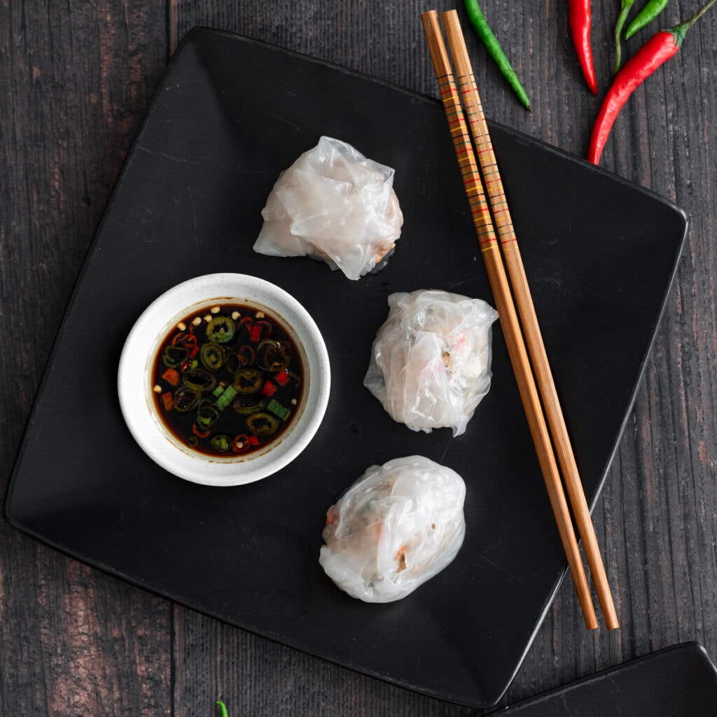 Steamed pork dumplings with dipping sauce