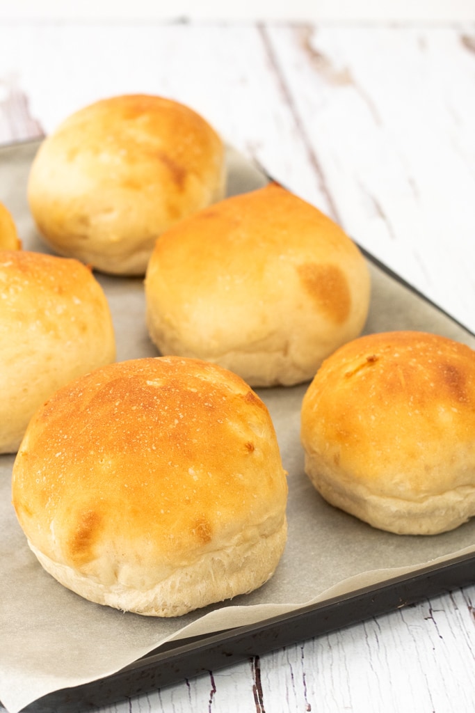 burger buns on a baking tray