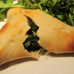 fatayer with filling coming out