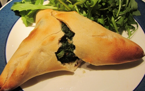 fatayer with filling coming out