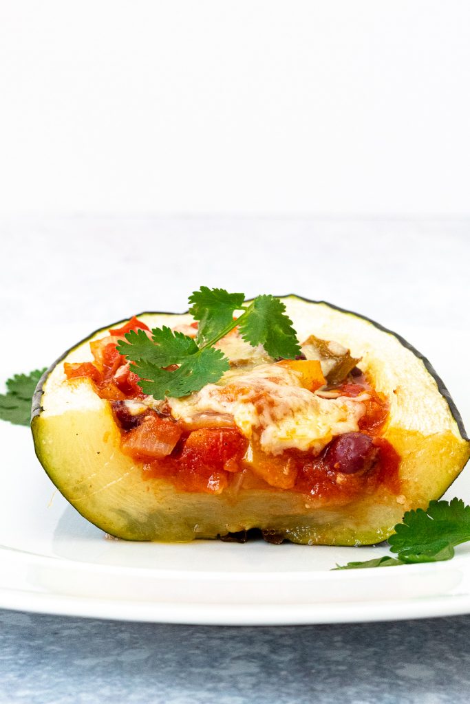 cross section of stuffed marrow with vegetarian chilli
