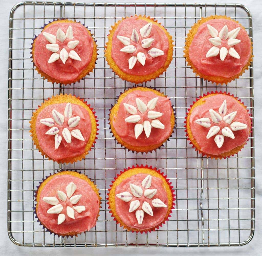 Marshmallow Flower Cupcakes on a cooling rack