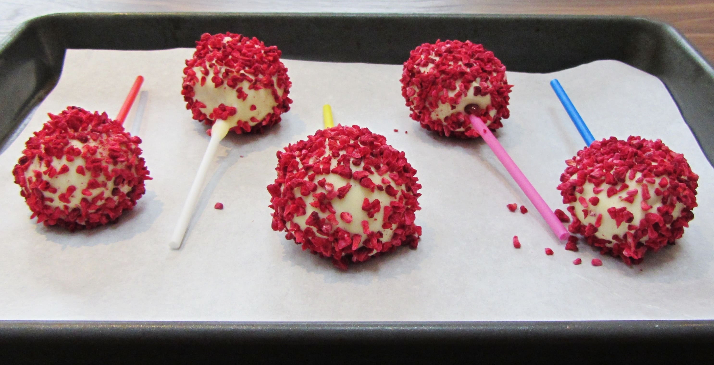 Golden oreo raspberry cookie pops