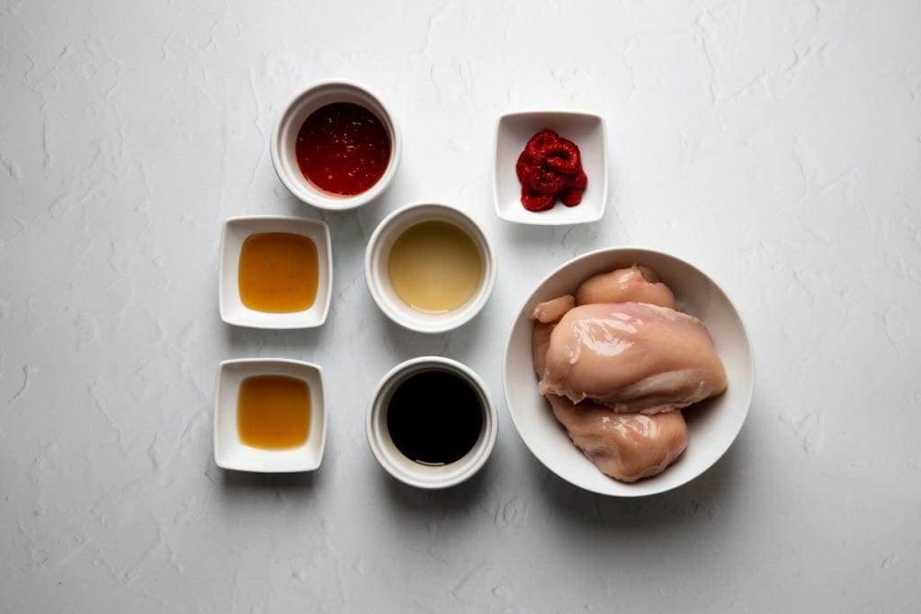Ingredients for slow cooker sriracha chicken tacos