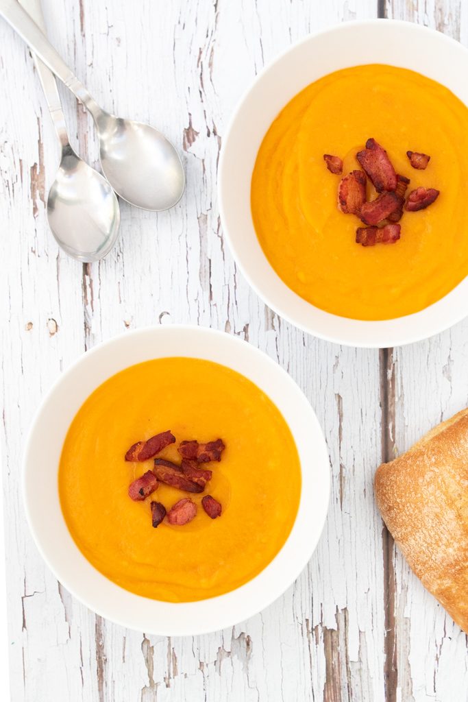 white bowls filled with roasted vegetable soup