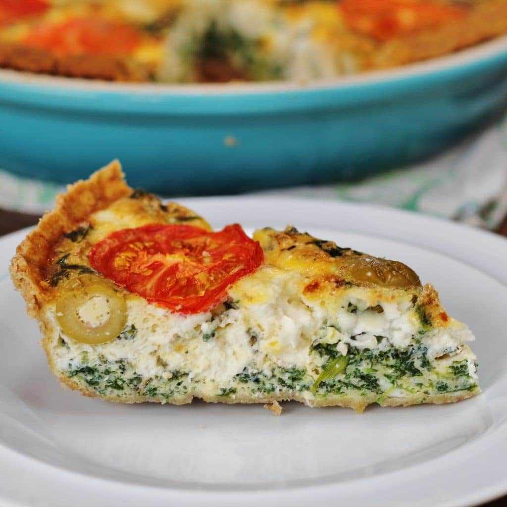sideways view of slice of Greek quiche