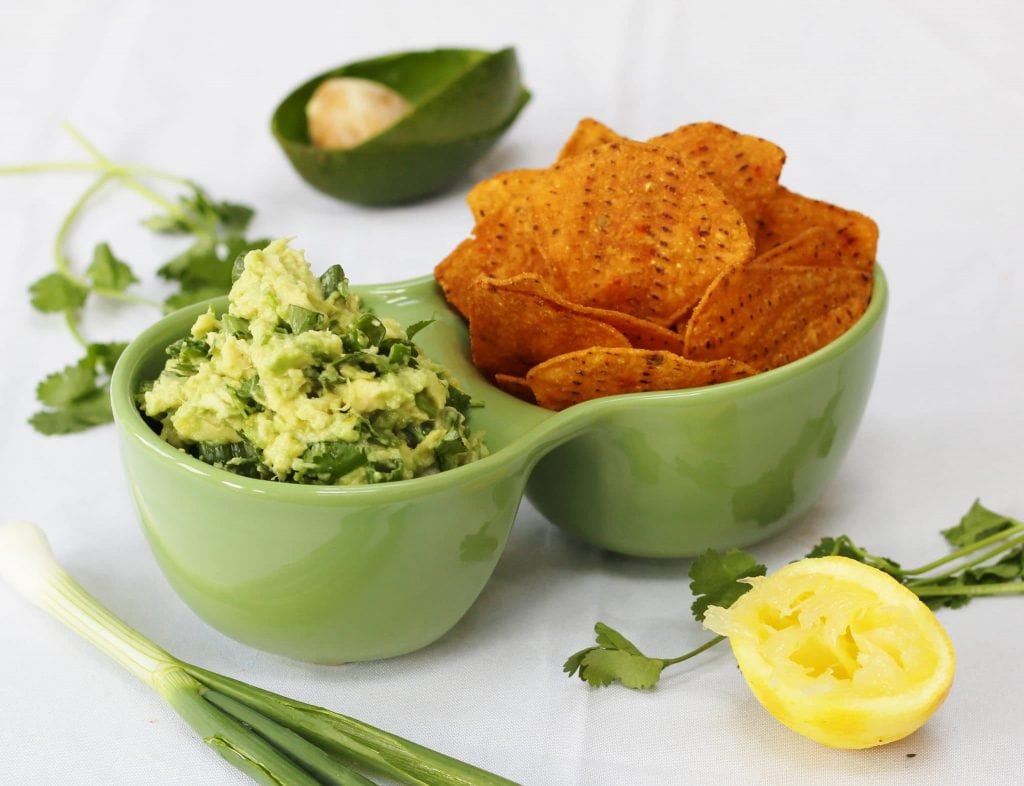 lemon and herb guacamole with tortilla chips