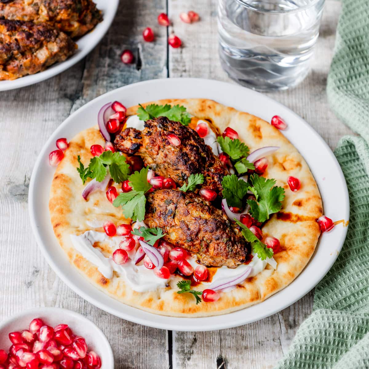 Plate with flatbread and Georgian lamb kebabs