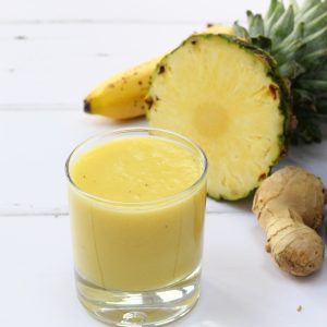 Tropical ginger smoothie made with pineapple, banana, mango and ginger