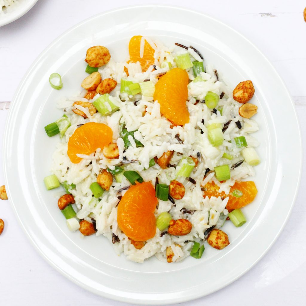 Rice salad with mandarins, spring onions and peanuts