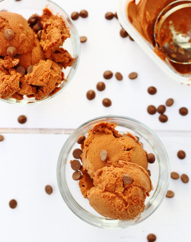 Chocolate banana nice cream in glass bowls with chocolate chips