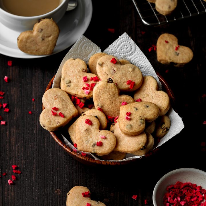 Dish of heart shaped strawberry flavoured shortbread biscuits