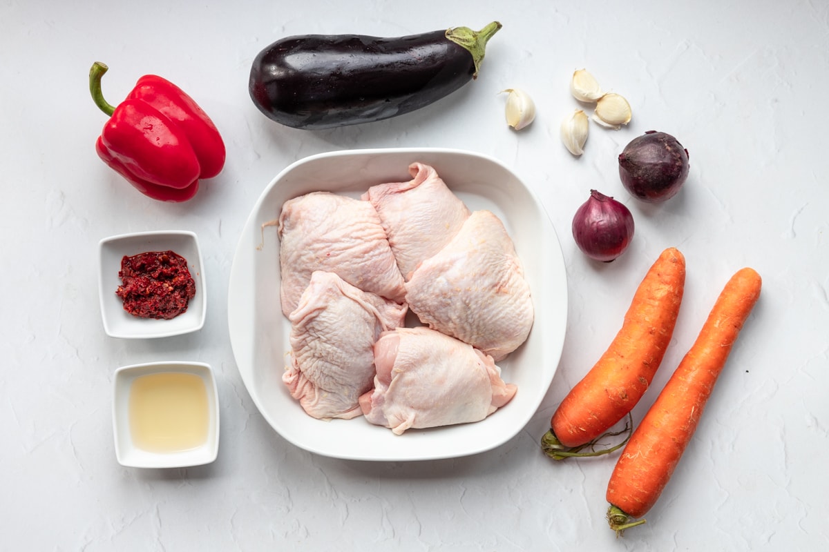 Ingredients for harissa chicken traybake