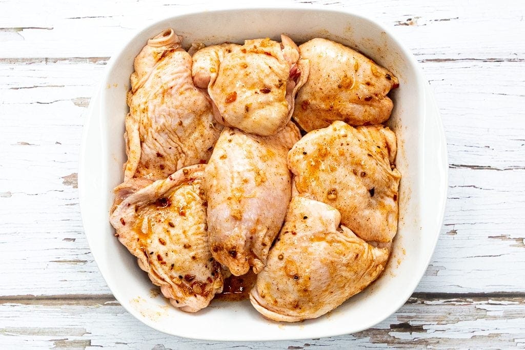 chicken thighs marinating