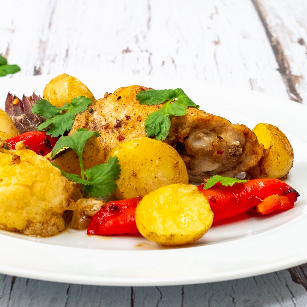 ras el hanout chicken, potatoes, peppers and cauliflower