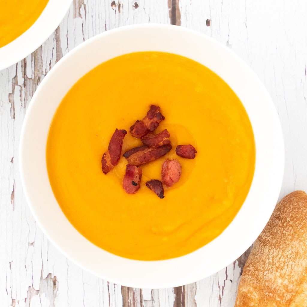 Leftover roasted vegetable soup topped with bacon