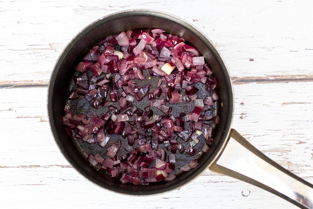 red onions in a pan
