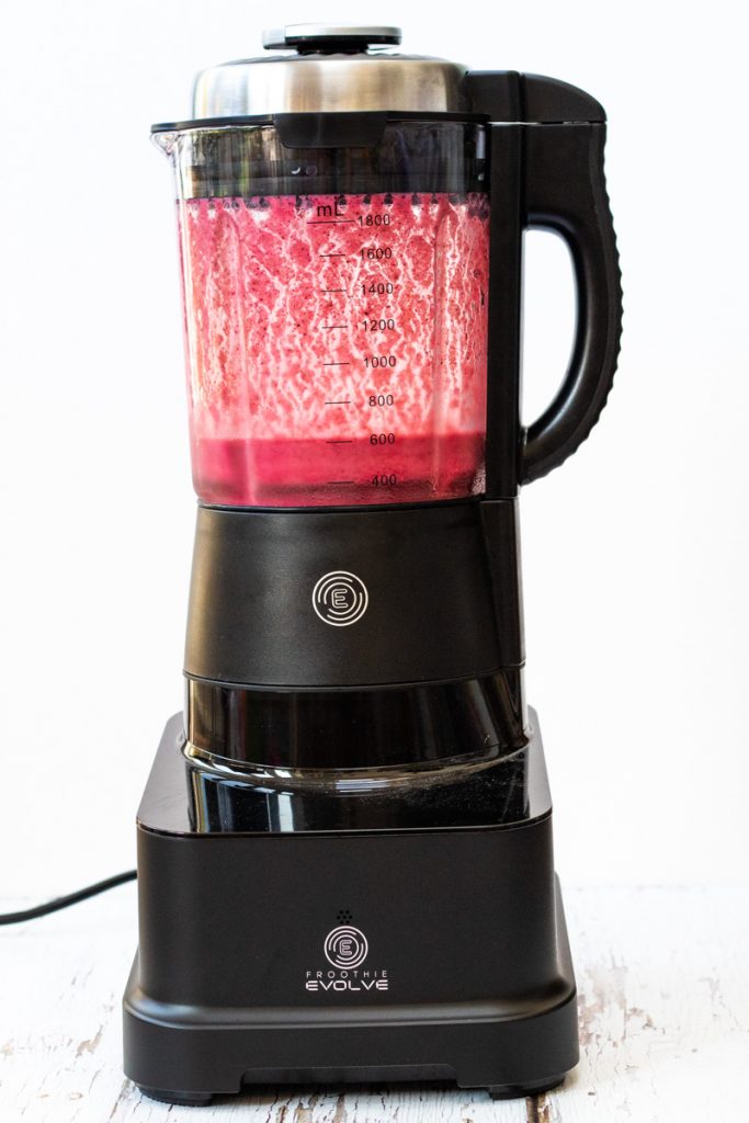 red berry smoothie in the Froothie Evolve high speed blender