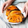 Plate of air fried cabbage wedges with harissa