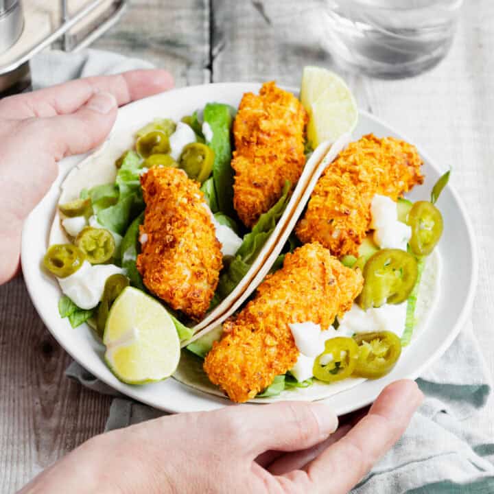 Homemade doritos fish fingers in tacos