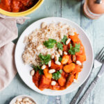 plate of African peanut stew with rice